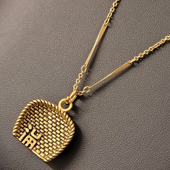 Avon Jewelry - AVON Woven Dustpan Pendant Gold-tone Necklace